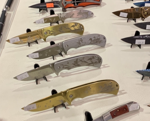 Switch blades and specialty knives at Techtron table, gun and knife shows in Oregon